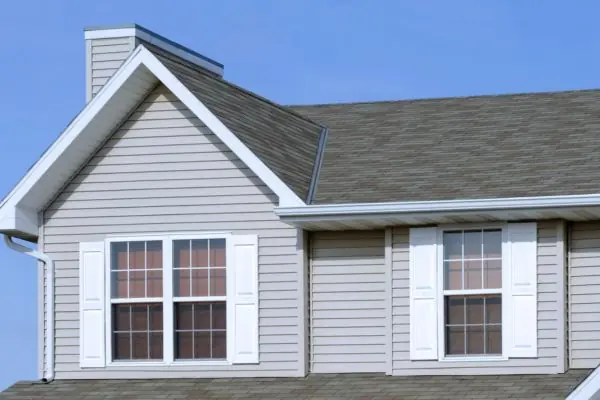 gray siding with white open windows